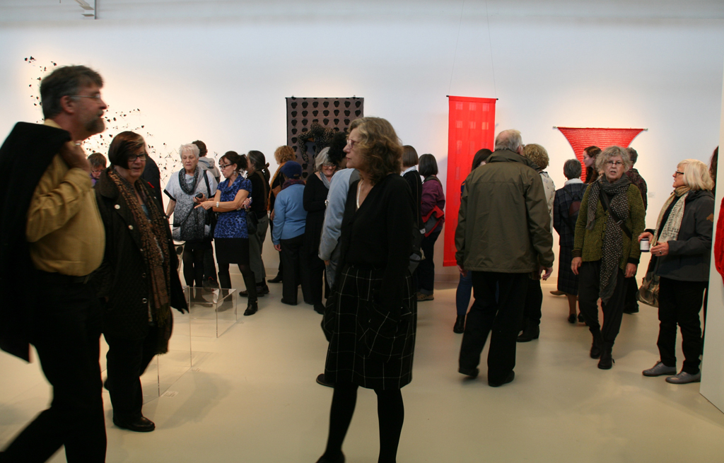 Artists and guests at the opening of the World of Threads Festival 2014.