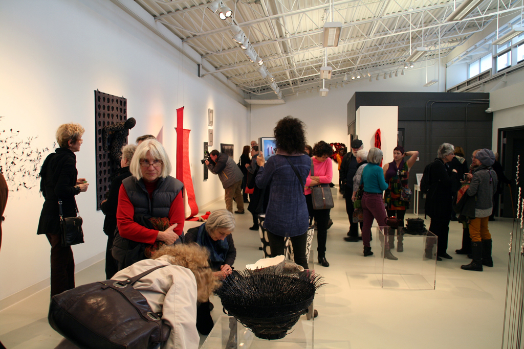 Artists and guests at the opening of the World of Threads Festival 2014.
