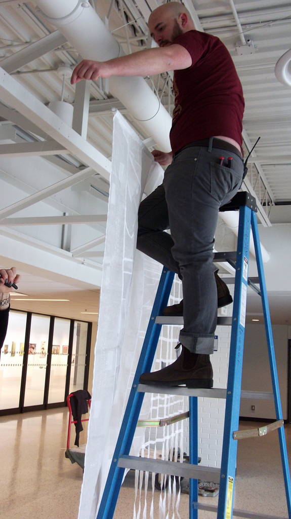 Installing Karen Goetzinger's "A State of Transparency" installation, World of Threads Festival 2014.