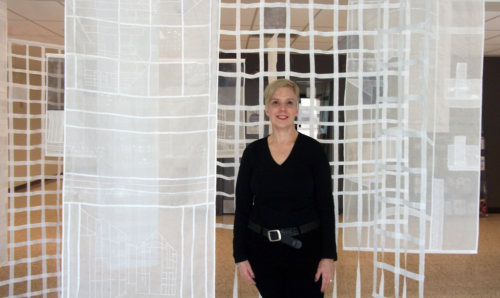 Artist: Karen Goetzinger at the opening of the World of Threads Festival 2014.