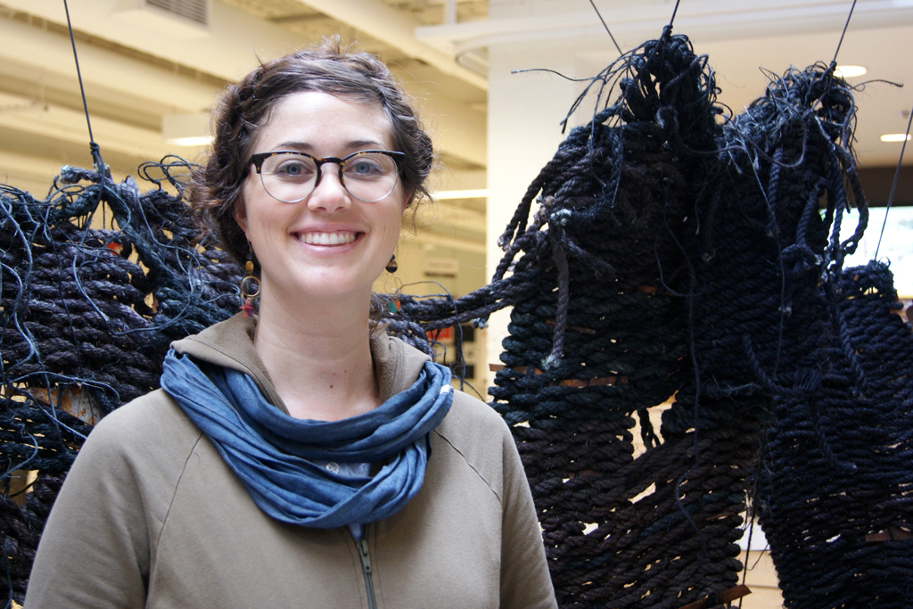 Artist: Mary Grisey at the opening of the World of Threads Festival 2014.