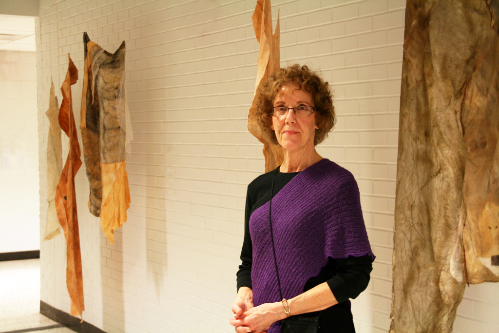 Artist: Pat Loucks at the opening of the World of Threads Festival 2014.