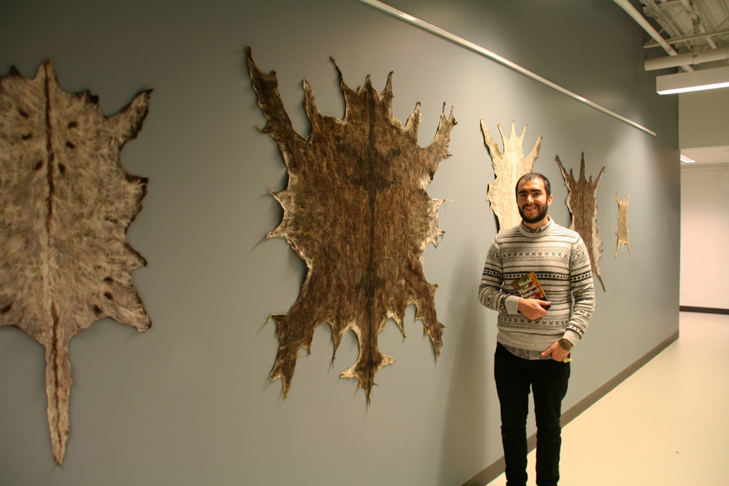 Artist: Daniel F Manchego at the opening of the World of Threads Festival 2014.