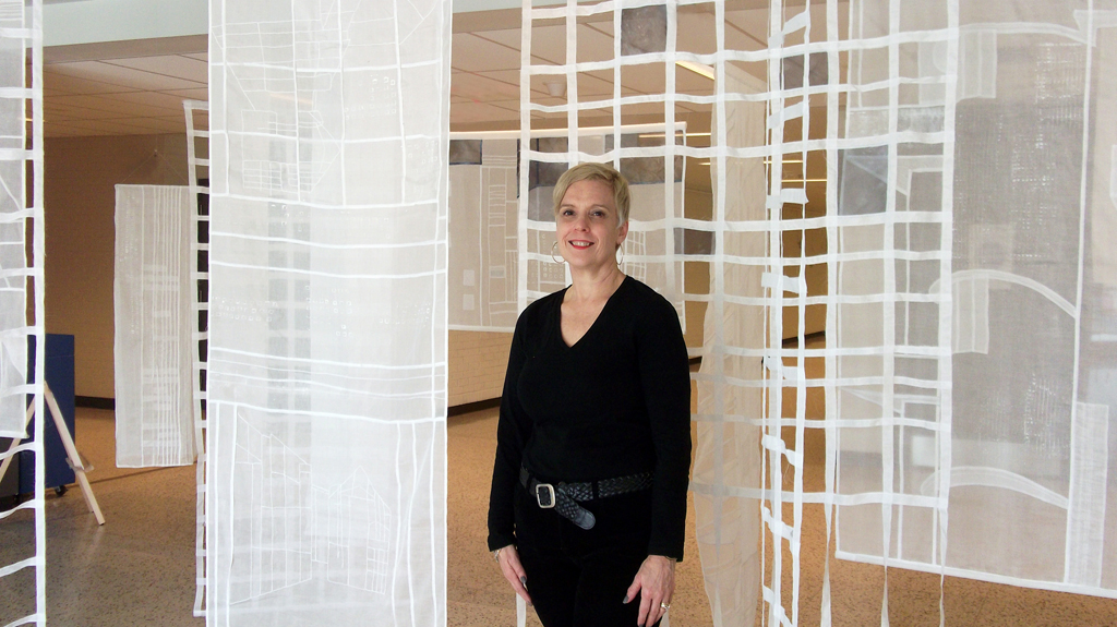 Artist: Karen Goetzinger at the opening of the World of Threads Festival 2014.