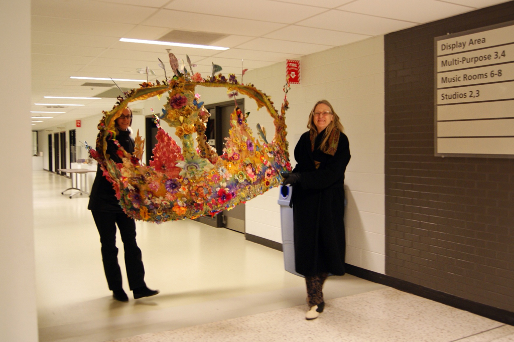 Artist: Jacqueline Treloar delivering her installation, World of Threads Festival 2014.