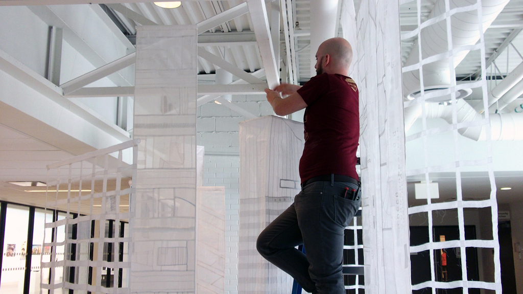Installing Karen Goetzinger's "A State of Transparency" installation, World of Threads Festival 2014.