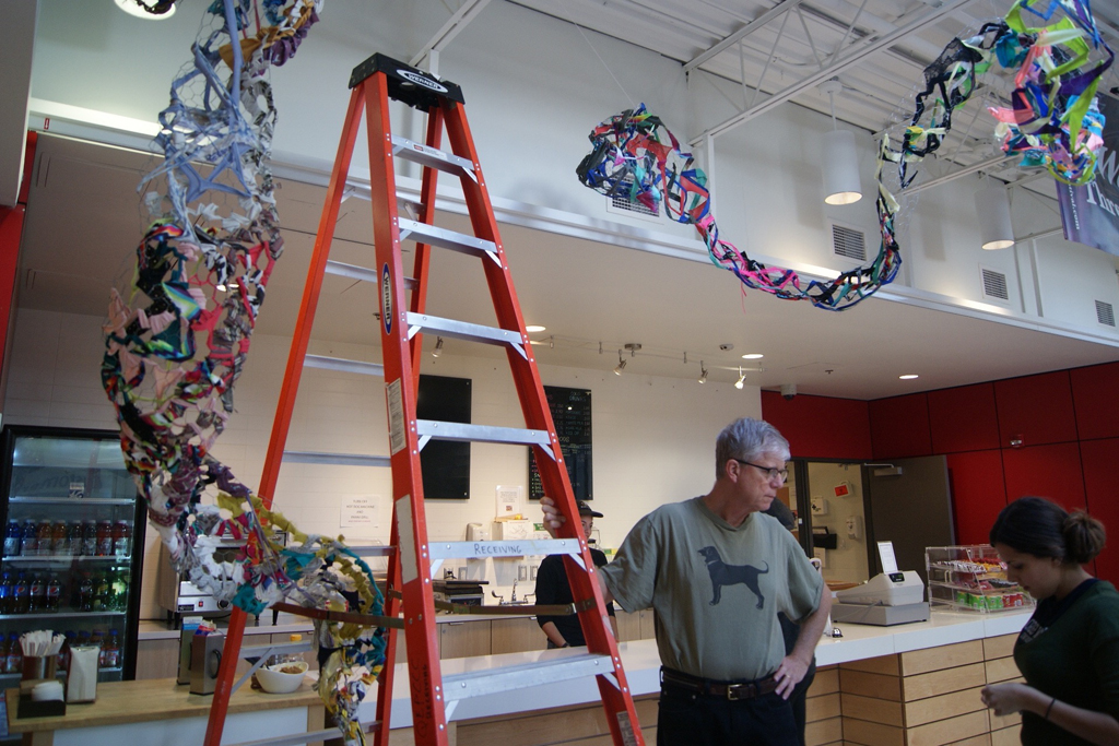 Installing art installation by Olivia Tripp Morrow, World of Threads Festival 2016.