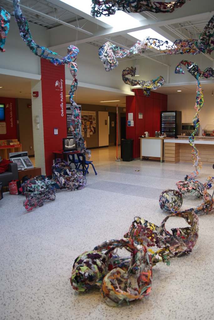 Installing art installation by Olivia Tripp Morrow, World of Threads Festival 2016.