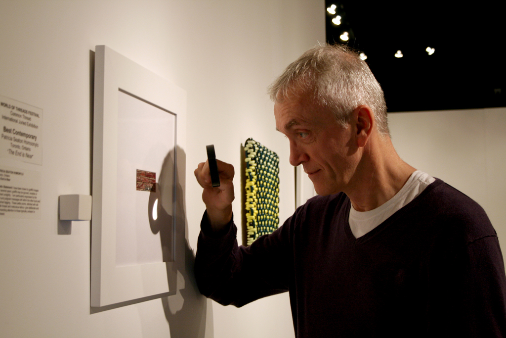 Visitor, Graham Jackson at the opening of Thread, Common Thread International exhibition Part 3, World of Threads Festival 2009.