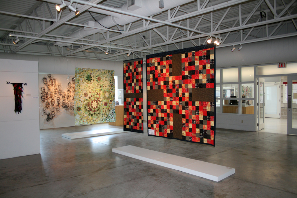 Installation view: Threads That Bind exhibition, World of Threads Festival 2009.