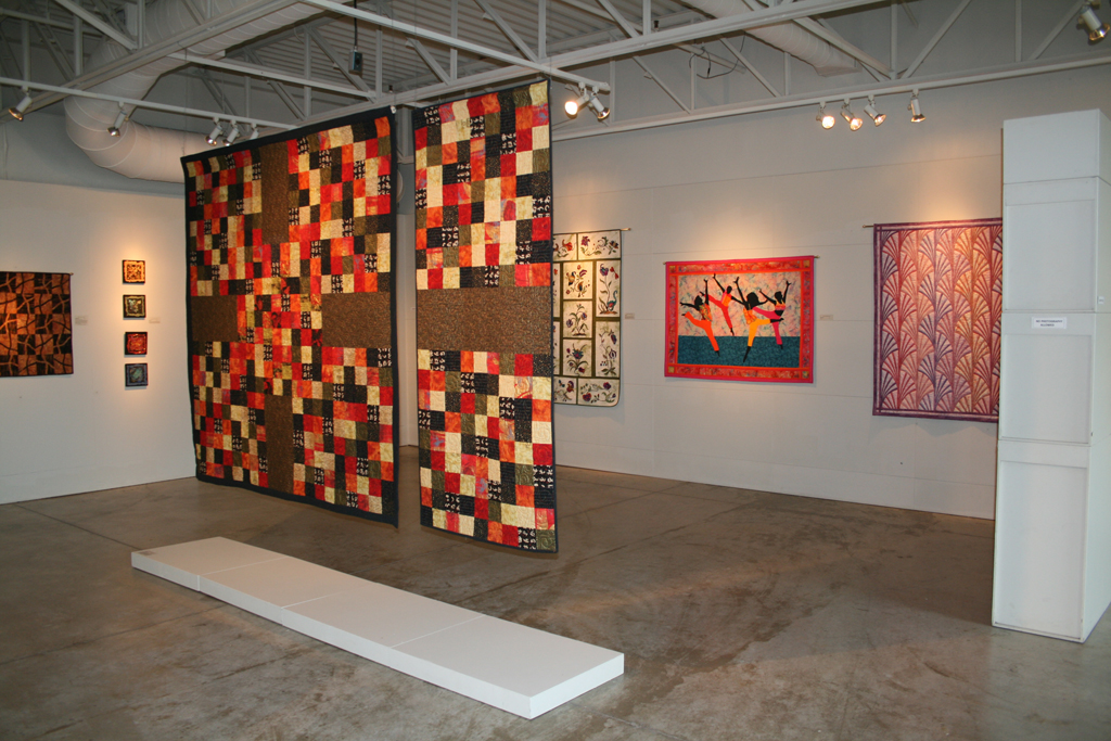 Installation view: Threads That Bind exhibition, World of Threads Festival 2009.