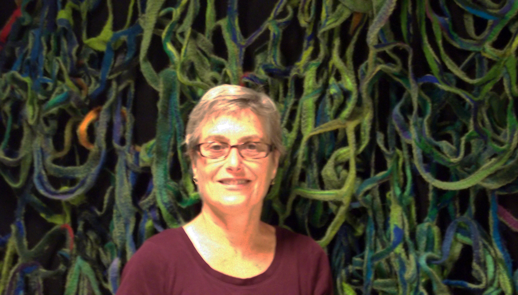 Artist: Mary Giehl at the opening of the World of Threads Festival 2014.