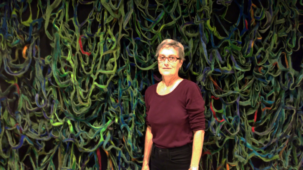 Artist: Mary Giehl at the opening of the World of Threads Festival 2014.
